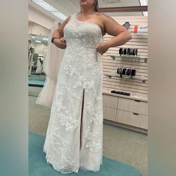 David’s Bridal- One-shoulder beaded wedding dress with overskirt - Picture 10 of 12